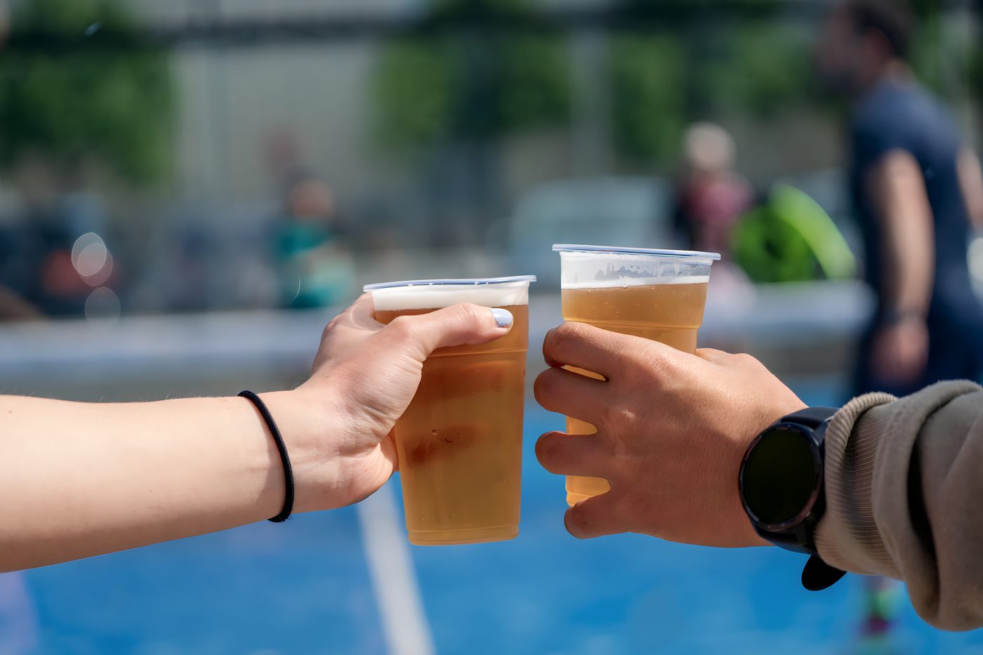 Players toasting at a Padel & Go tournament